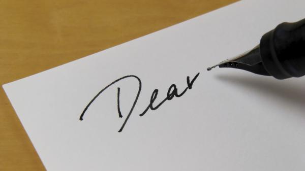 How can I support my friend on a Mormon mission?  Should I date other people in the meantime?