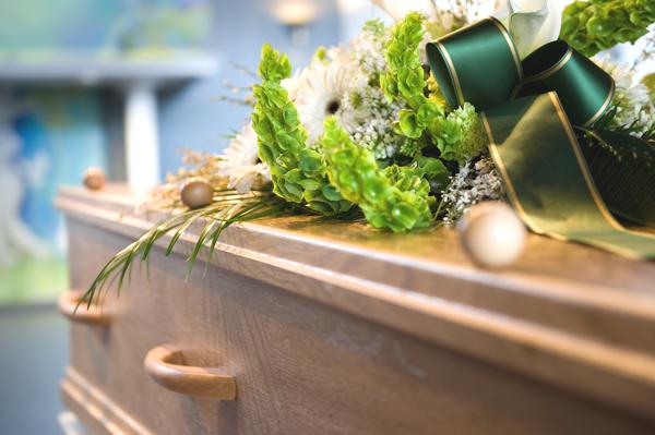Is the cap of an endowed brother left off in a burial?