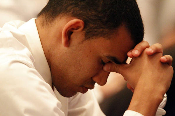 Man in a White Shirt Praying | Can You Fast For Multiple Things at Once in Christianity? | The Power of Fasting