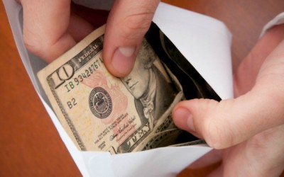 Can someone engaged in a liquor selling business pay tithes?