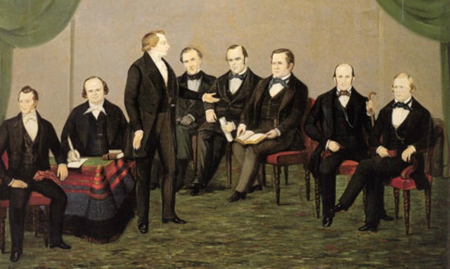 Joseph Smith and the Quorum of the 12 Apostles Seated Around Him | Why did the Quorum of the Twelve Apostles Faced Excommunication?