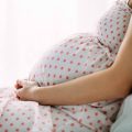 Pregnant Woman Holding Her Belly | When Does the Spirit Enter the Body: LDS Church Views | When Does the Soul Enter the Body?