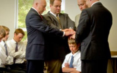 In a divorce situation, who chooses who can ordain to the Aaronic Priesthood?